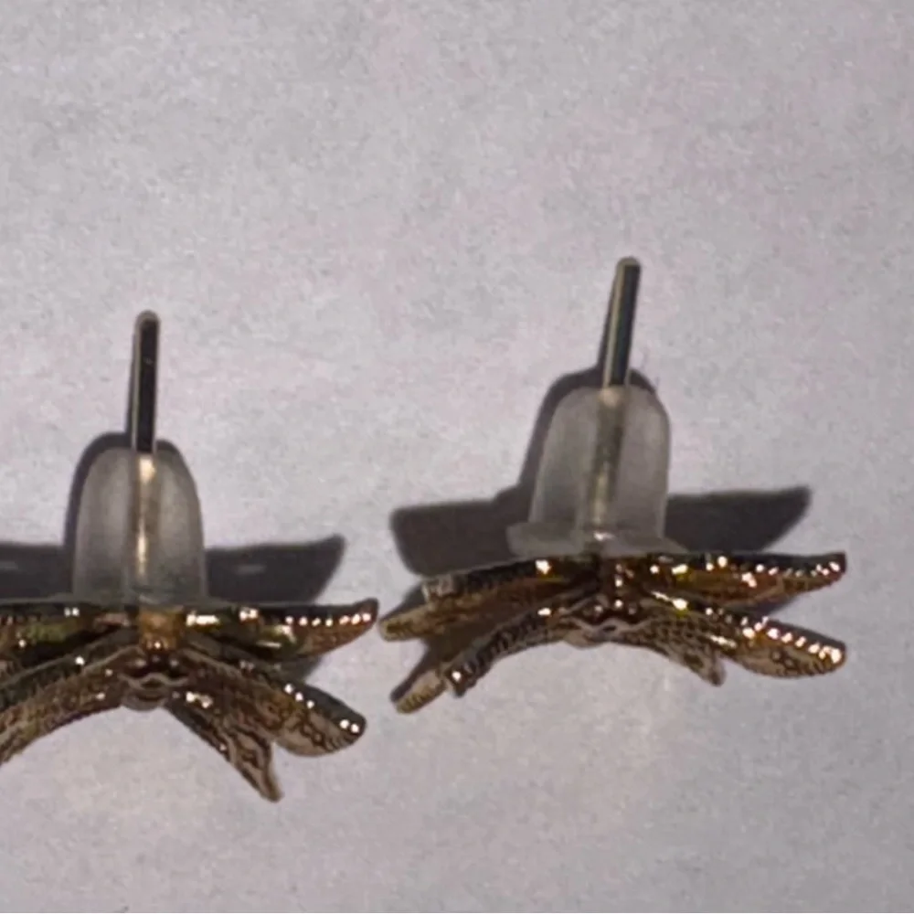 Gold tone intricate Butterfly design Earrings NWOT